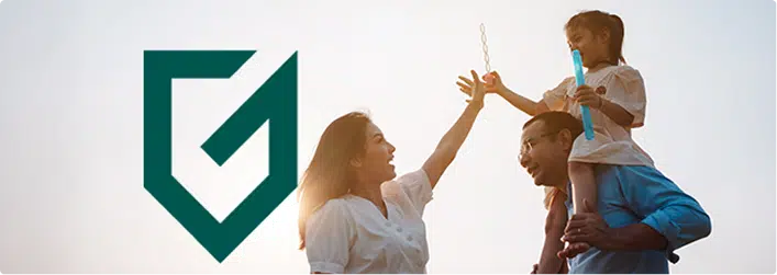 A smiling family plays with bubbles outdoors at sunset; a woman high-fives a girl sitting on a mans shoulders. A large GreenShield logo appears on the left side of the image.